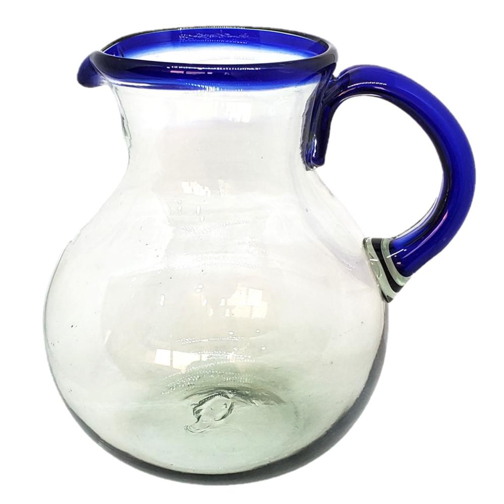 Ofertas / Jarra de vidrio soplado con borde azul cobalto / Ésta clásica jarra es perfecta para servir cualquier tipo de bebidas refrescantes.